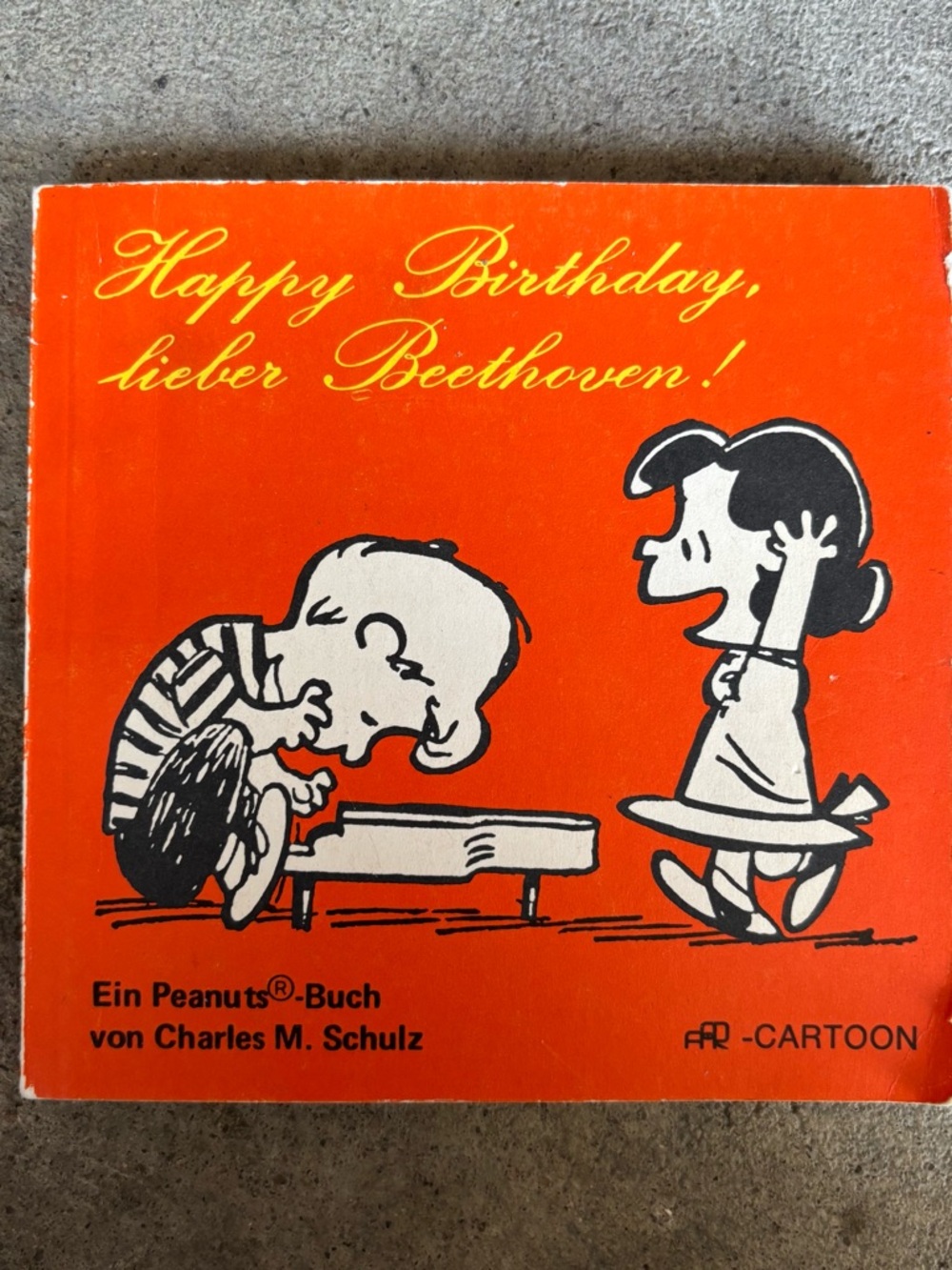 Peanuts Orange and Black Happy Birthday Lieber Beethoven Cover Art